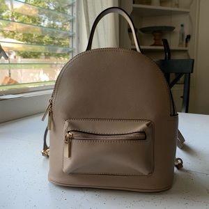 Barney’s Tan Leather Backpack